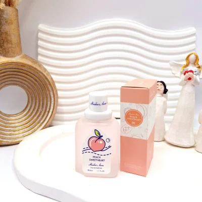 عطر بیکینی رایحه هلو حجم 50 میل برند میدن آنا کد E188-2